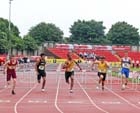 No 77 Kertis Beswick (Surrey) wins the Inter Boys 100 metres Hurdles.